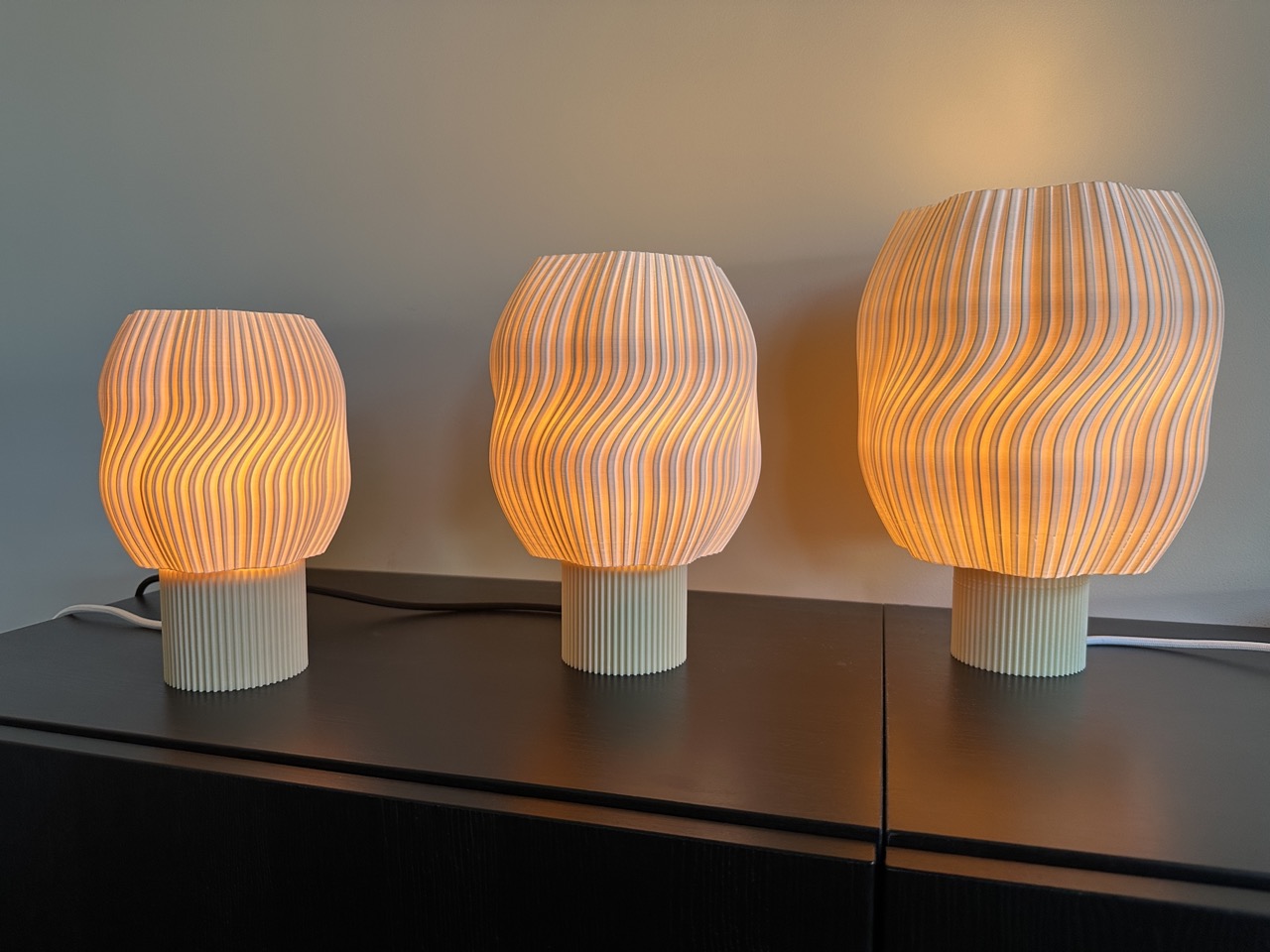 Warmly lit handcrafted lamps in an interior